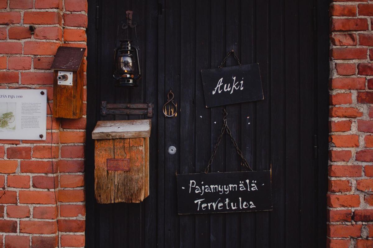 Finnish writing on a black door