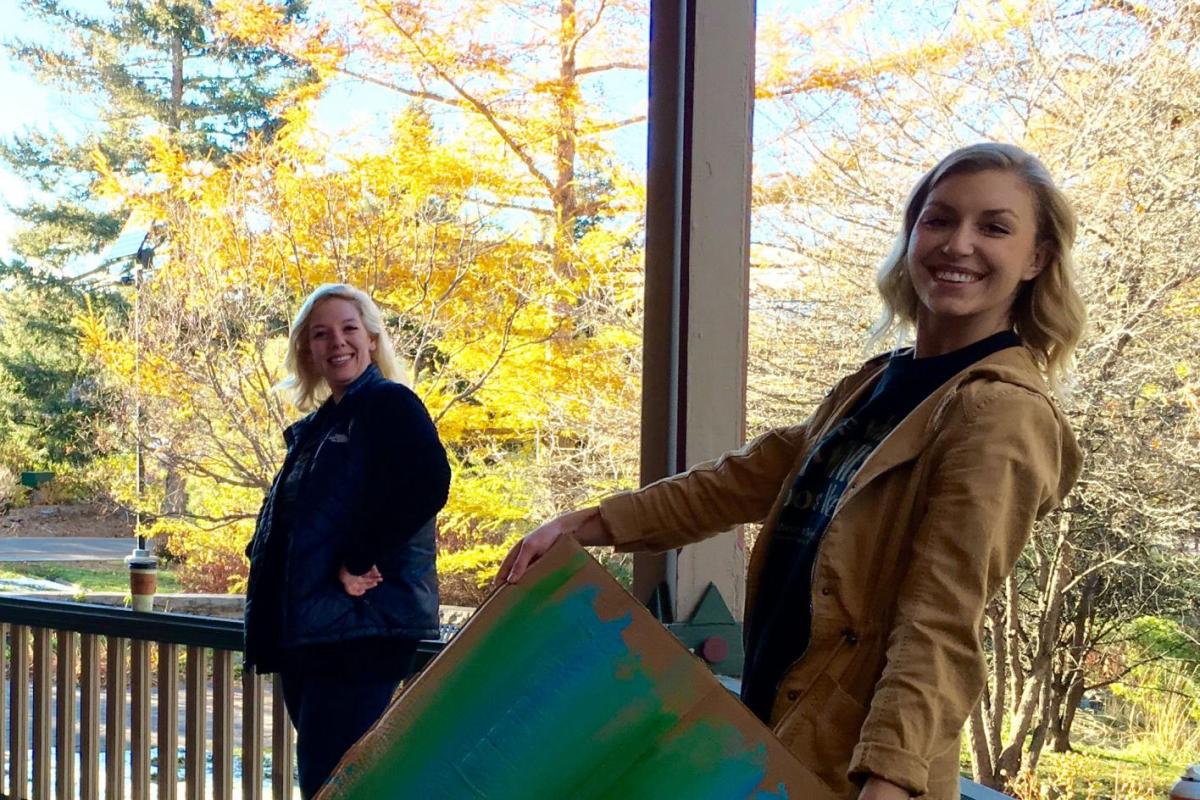 Interns painting