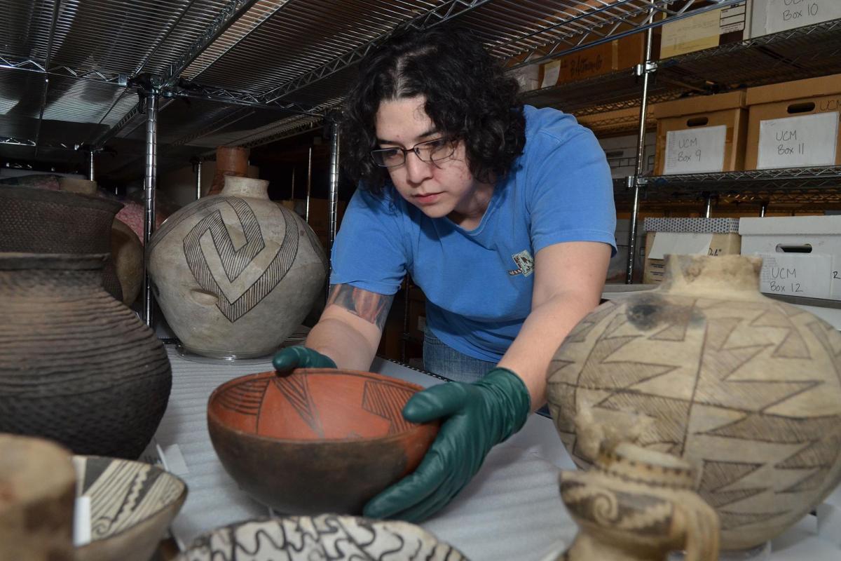 Installation of Native American pottery exhibit