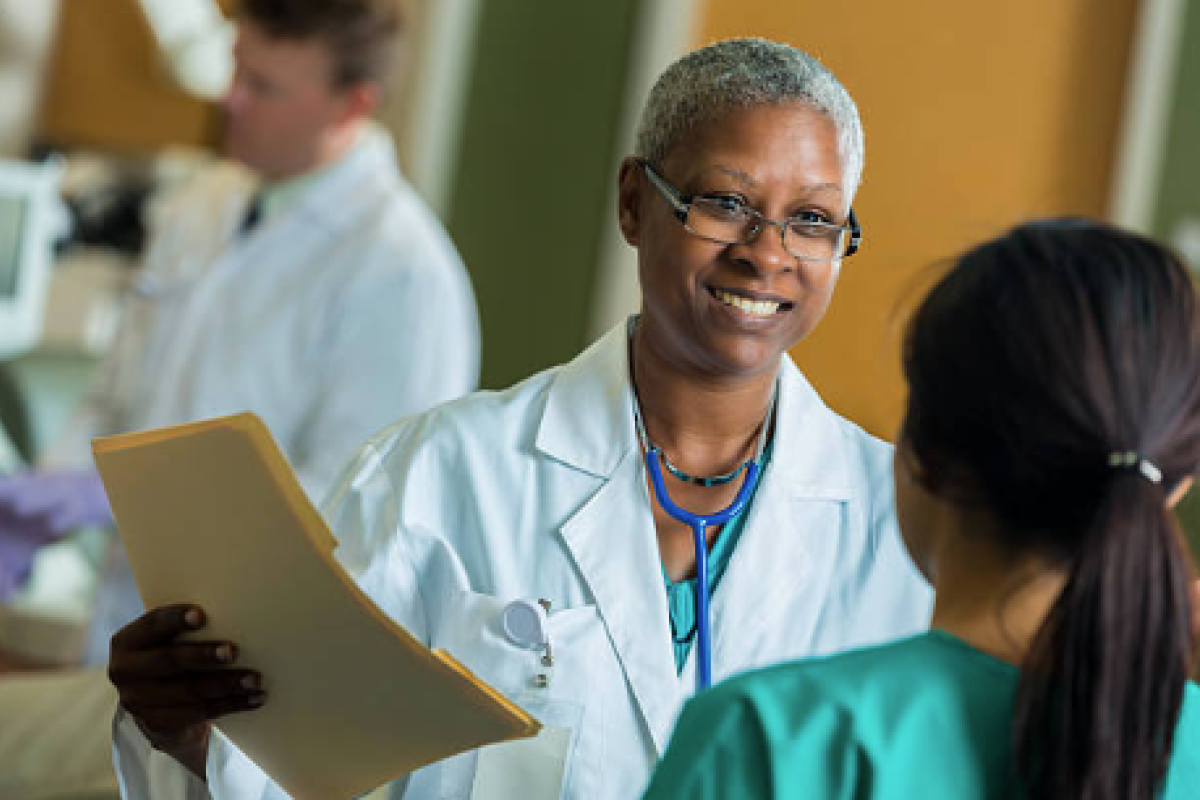 Hospital workers sharing a file