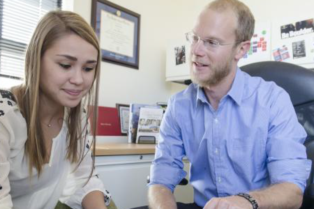 Career counselor with student