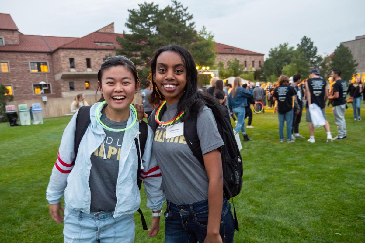 Students pose for a photo at the Black and Gold Bash celebration
