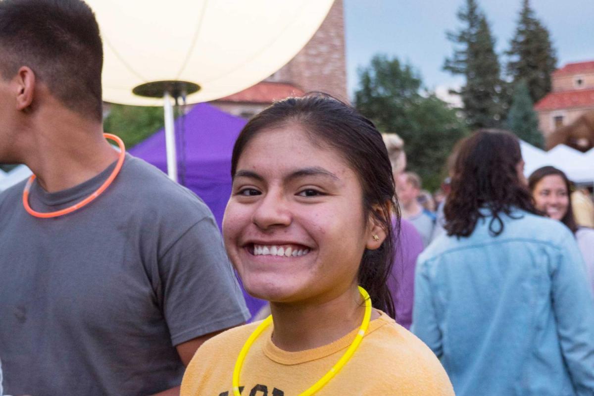CU Boulder student at event