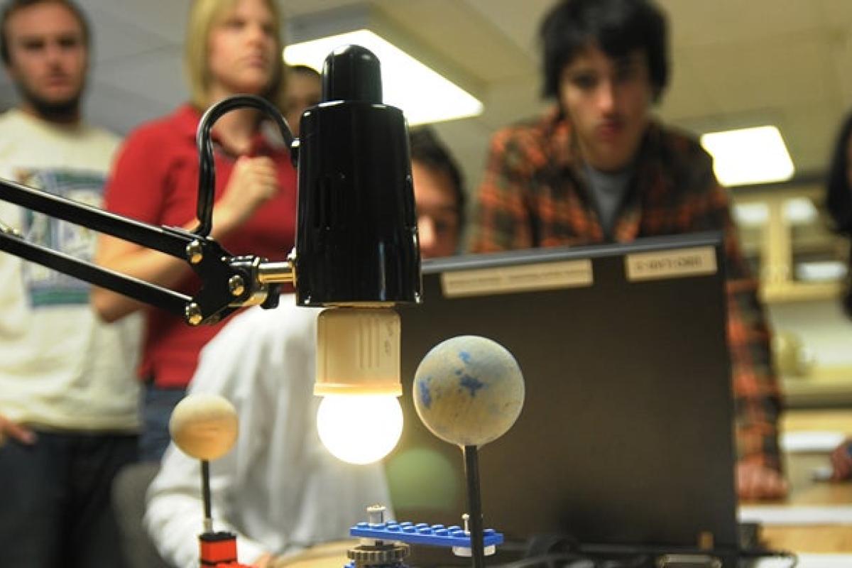 Students working on a planet model