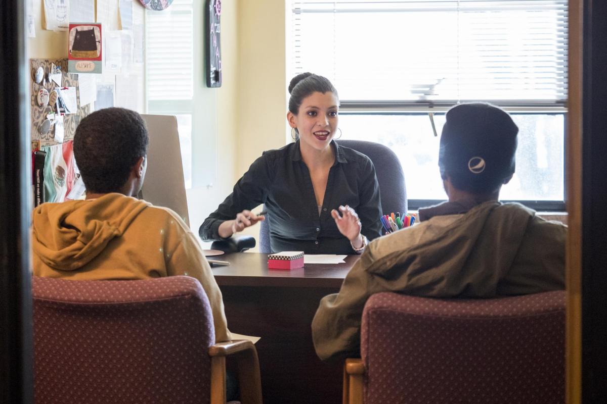 Advisor meeting with students