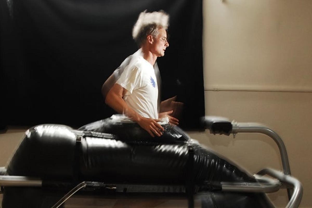 Person running on a machine