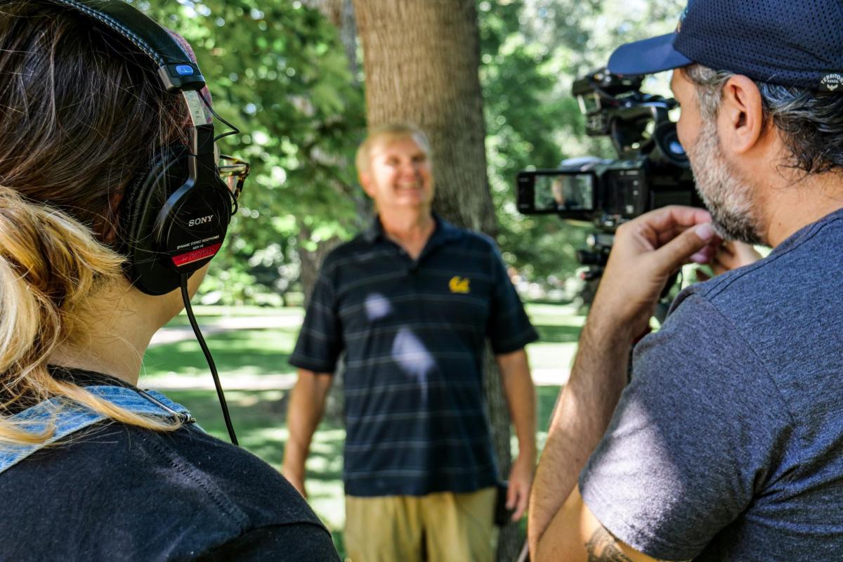 Videographers filming an intervoew