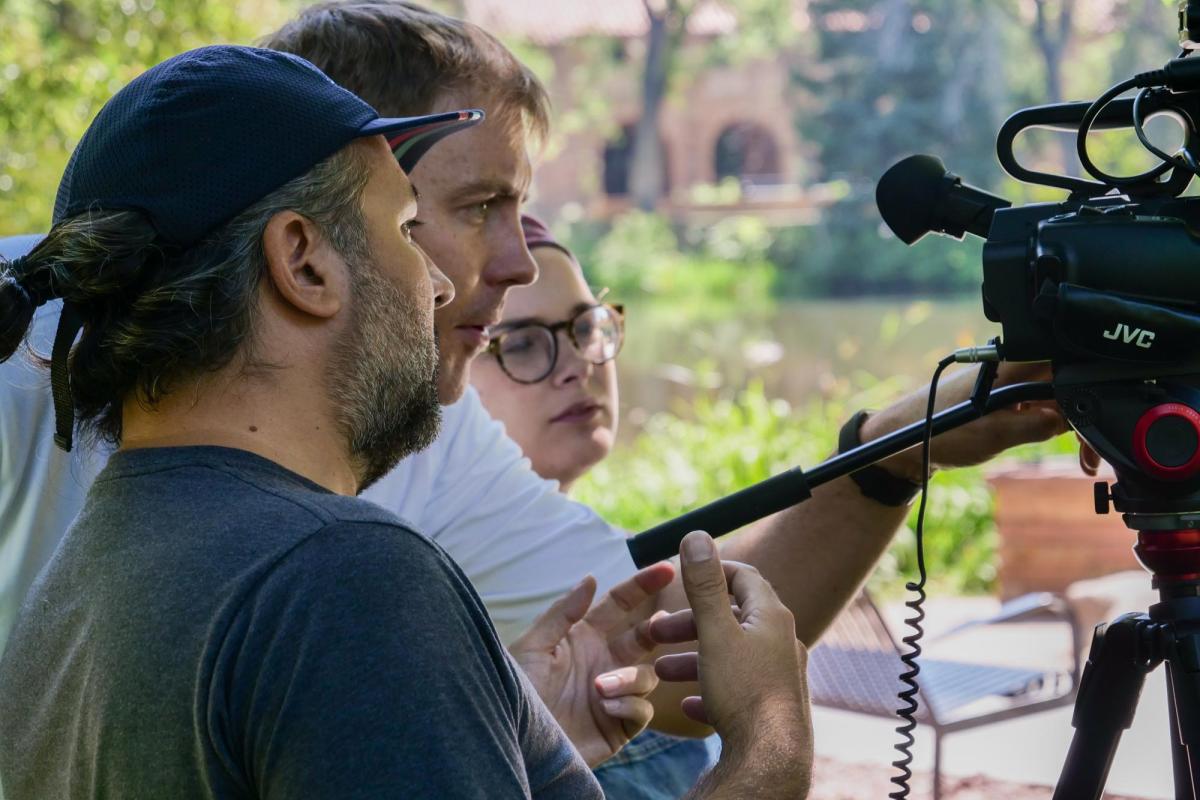 Group doing videography with camera