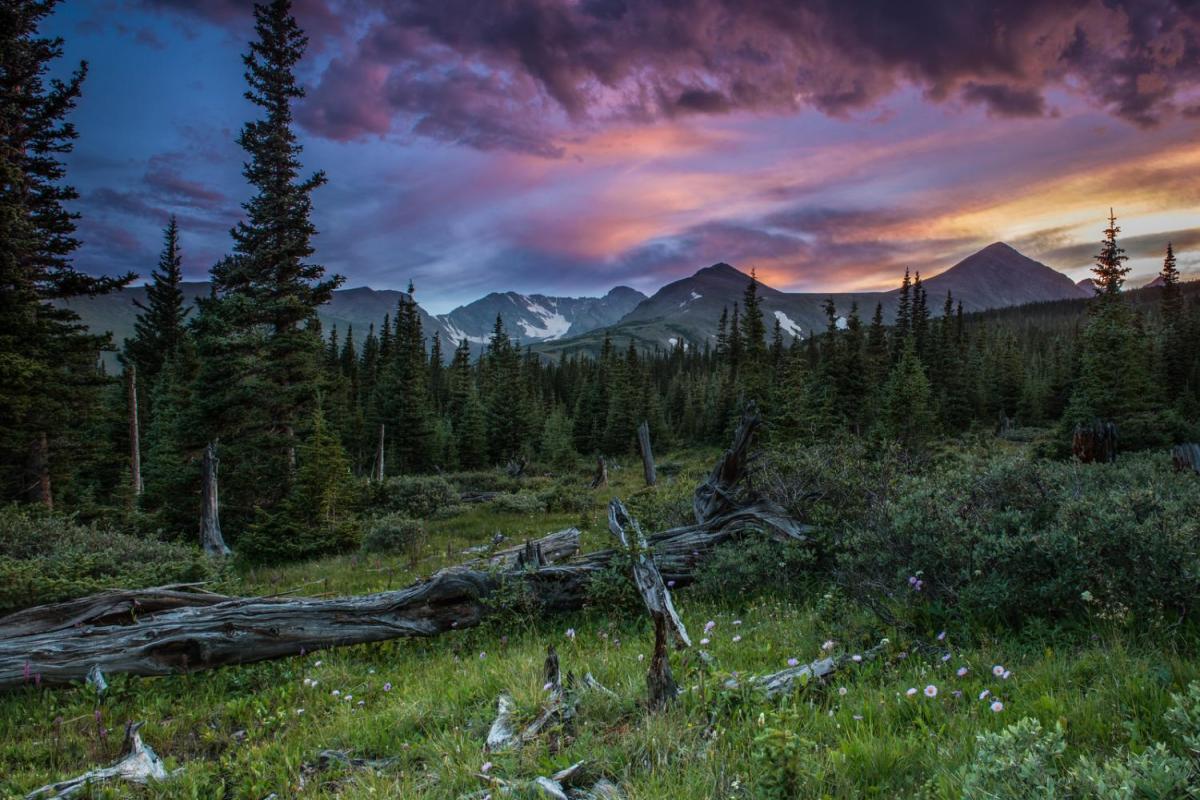 A mountain landscape at sunset