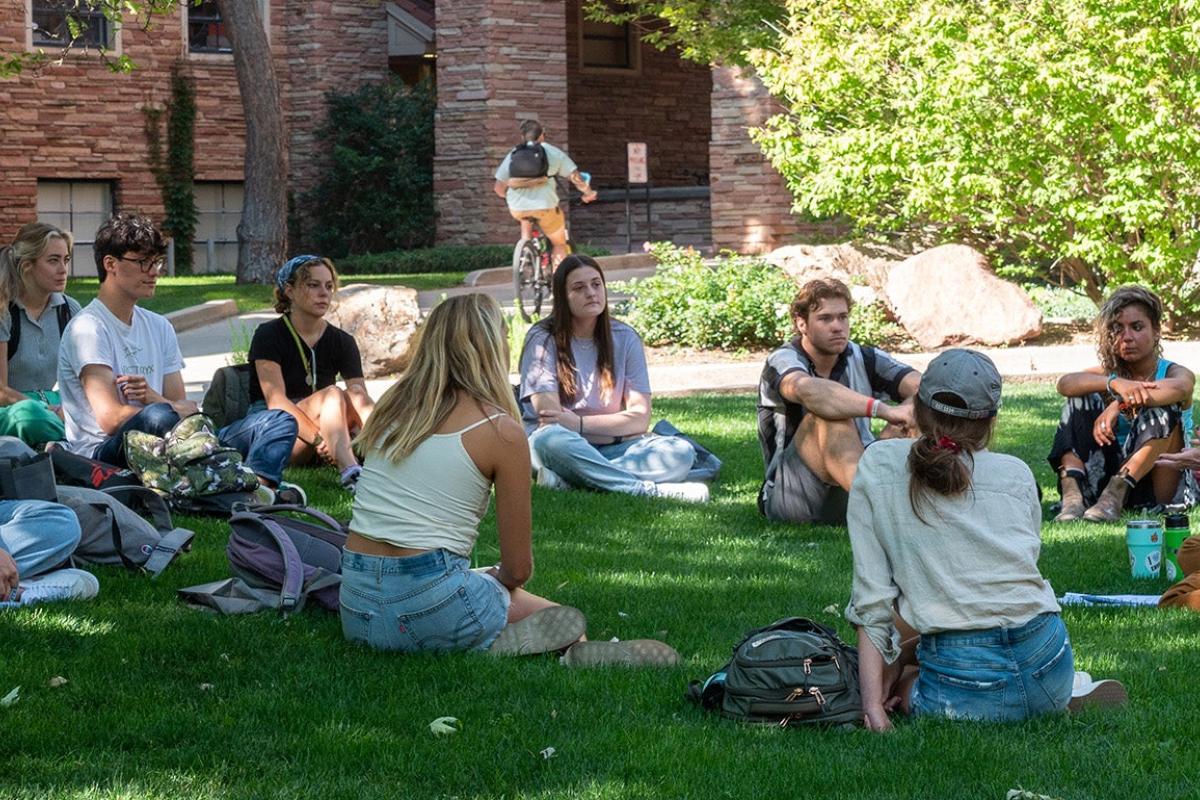 Class being held on campus lawn