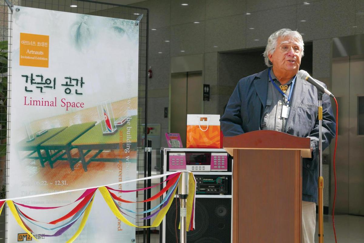 Professor at podium in South Korea