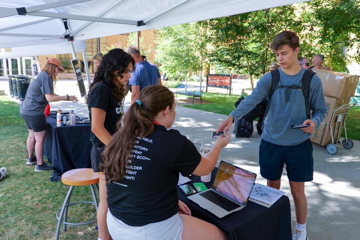Students on campus at table