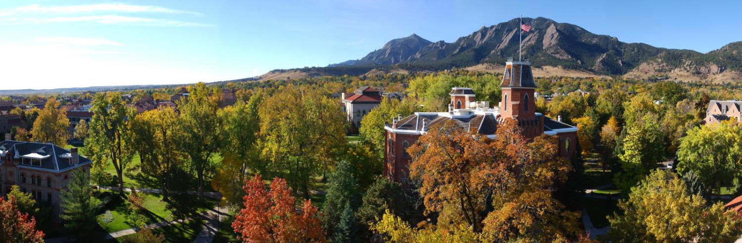 Old Main with Flatirons in the background