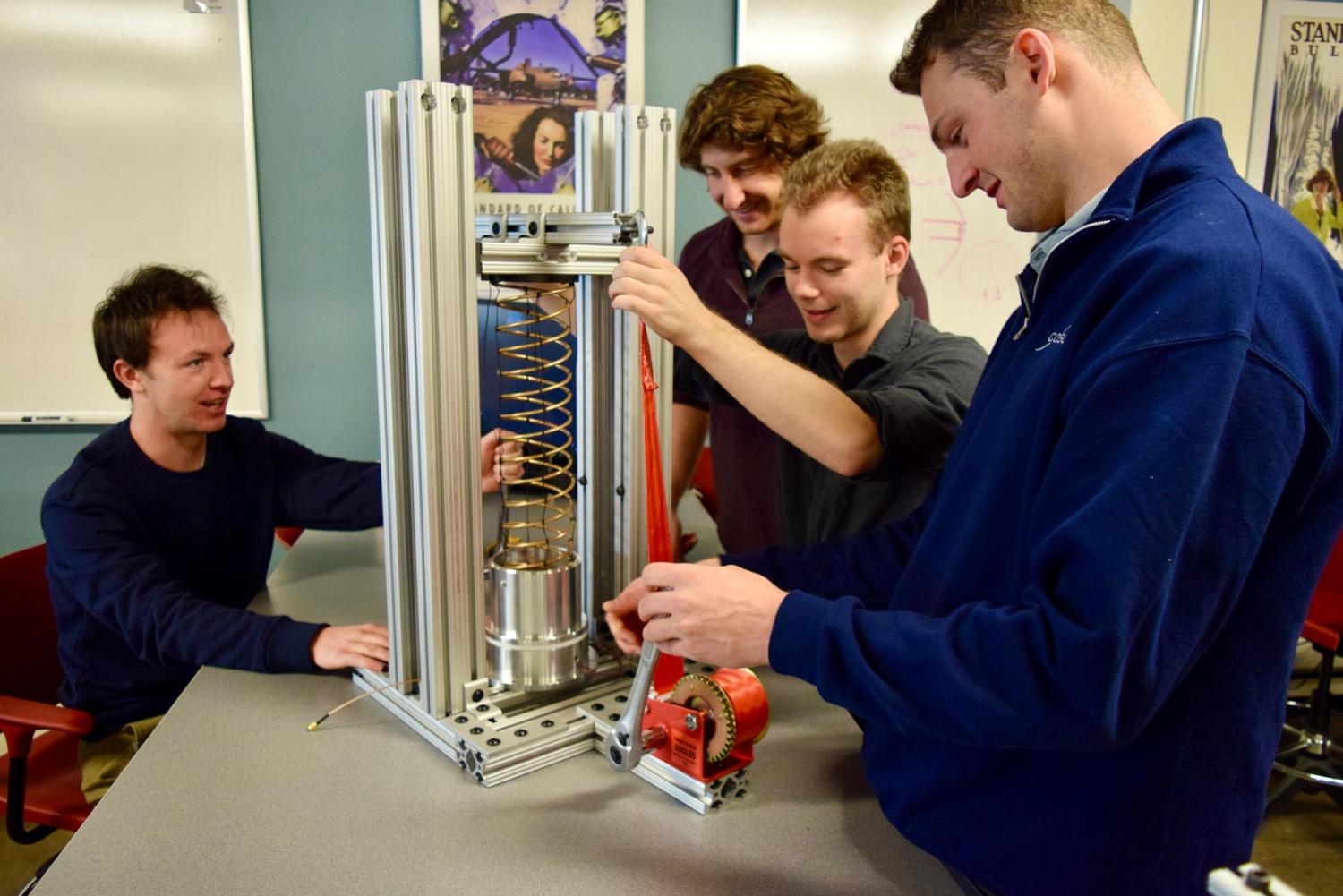 Students from Paul M. Rady Department of Mechanical Engineering with compatible antenna