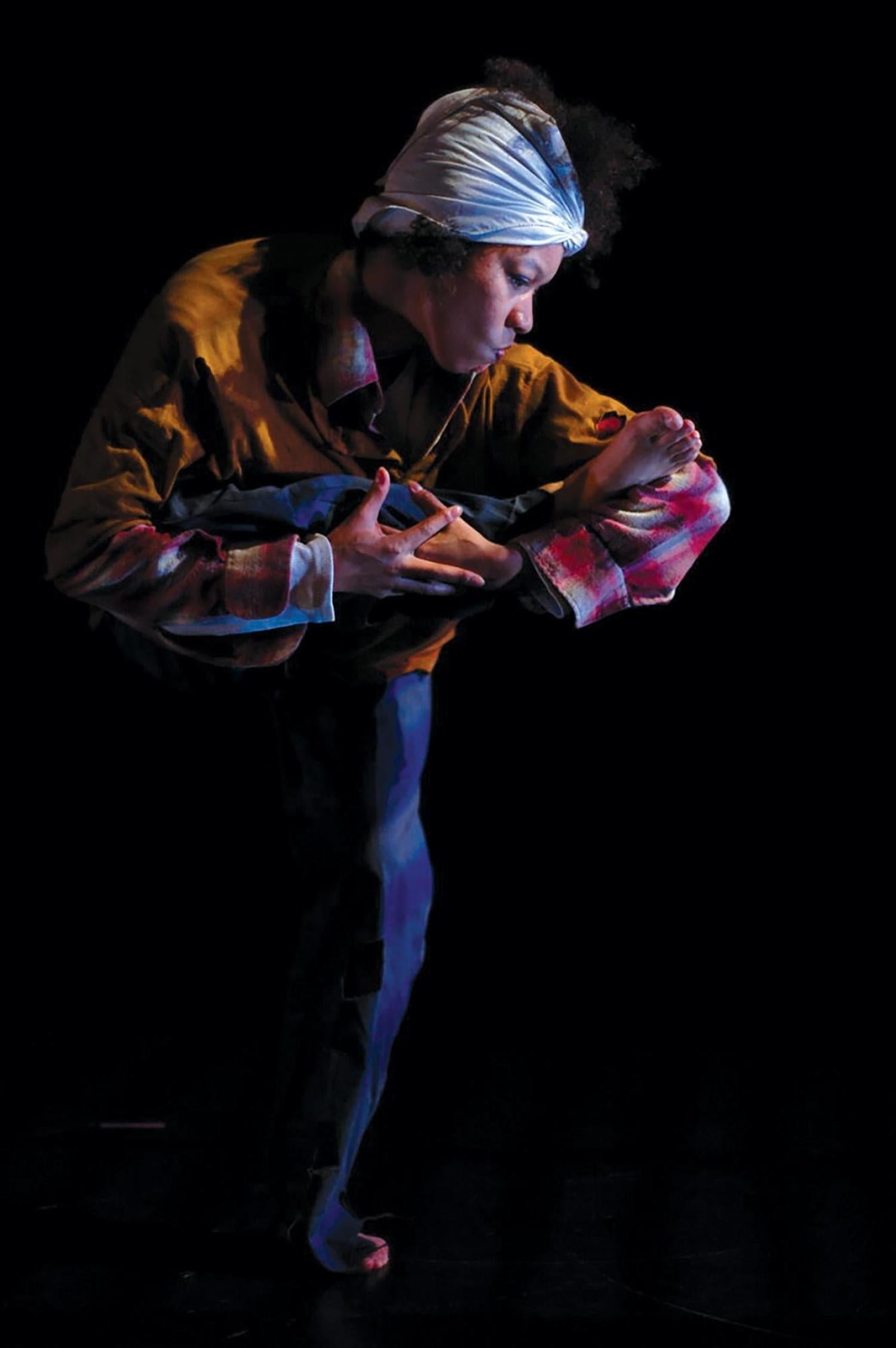 Dancer in costume on stage