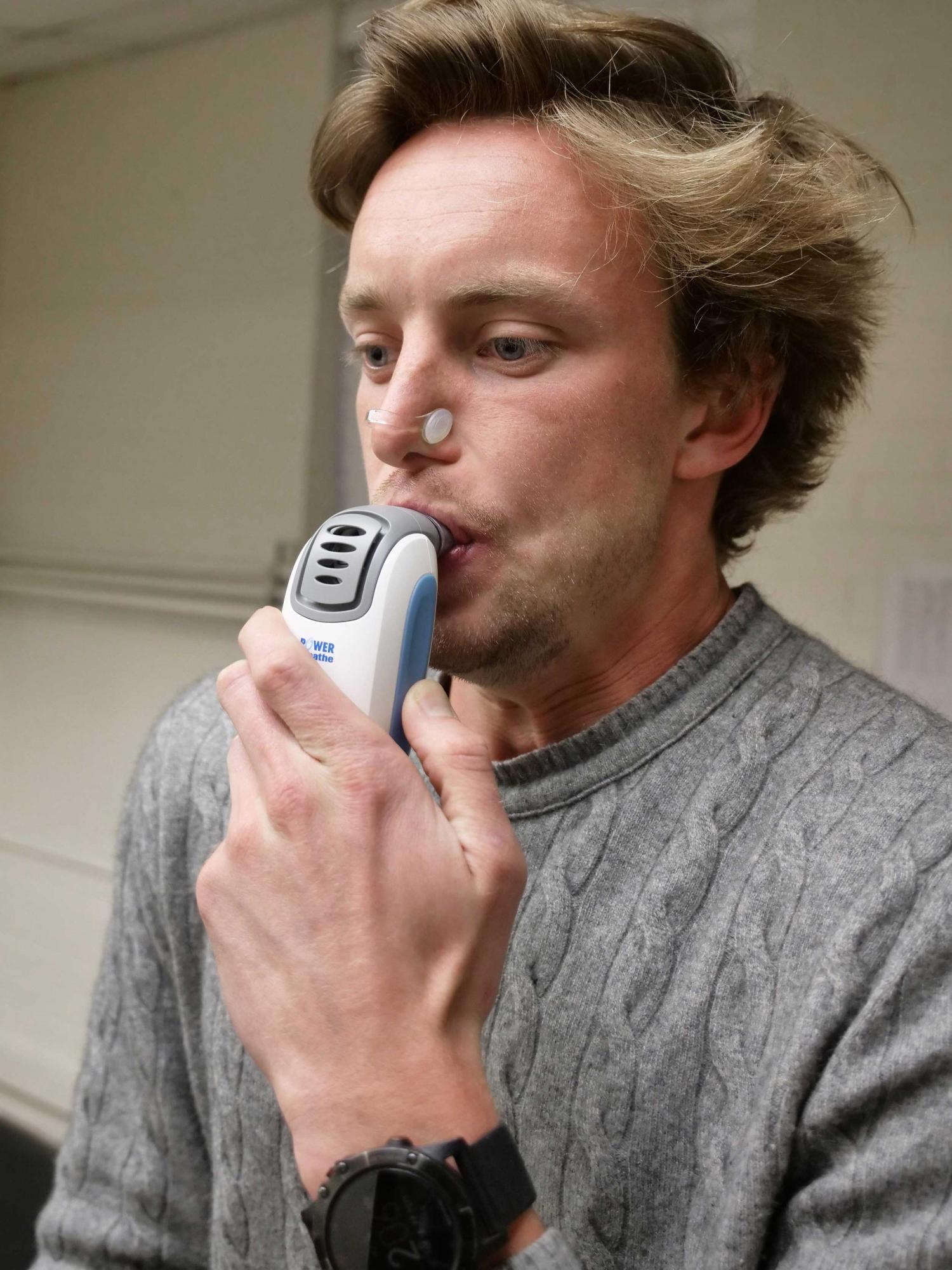 Person using 5-minute workout device