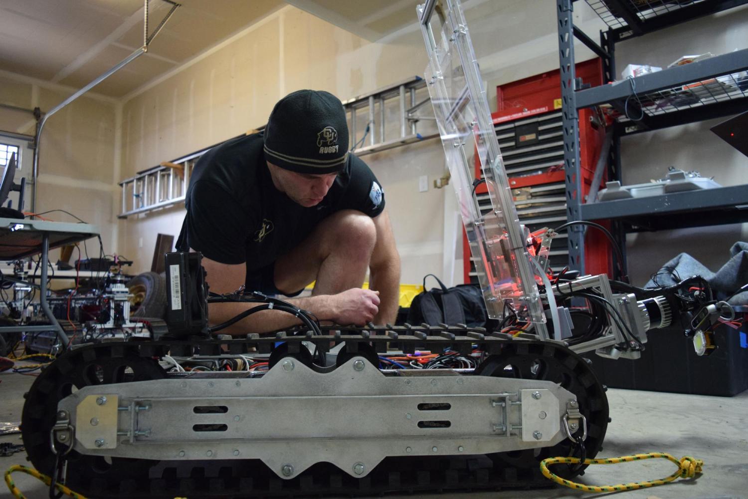 Student working on robot