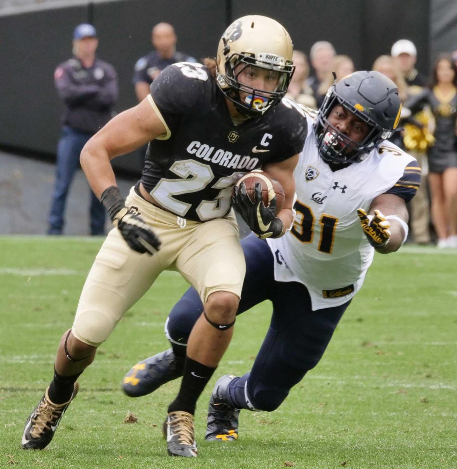 CU Boulder football player in action