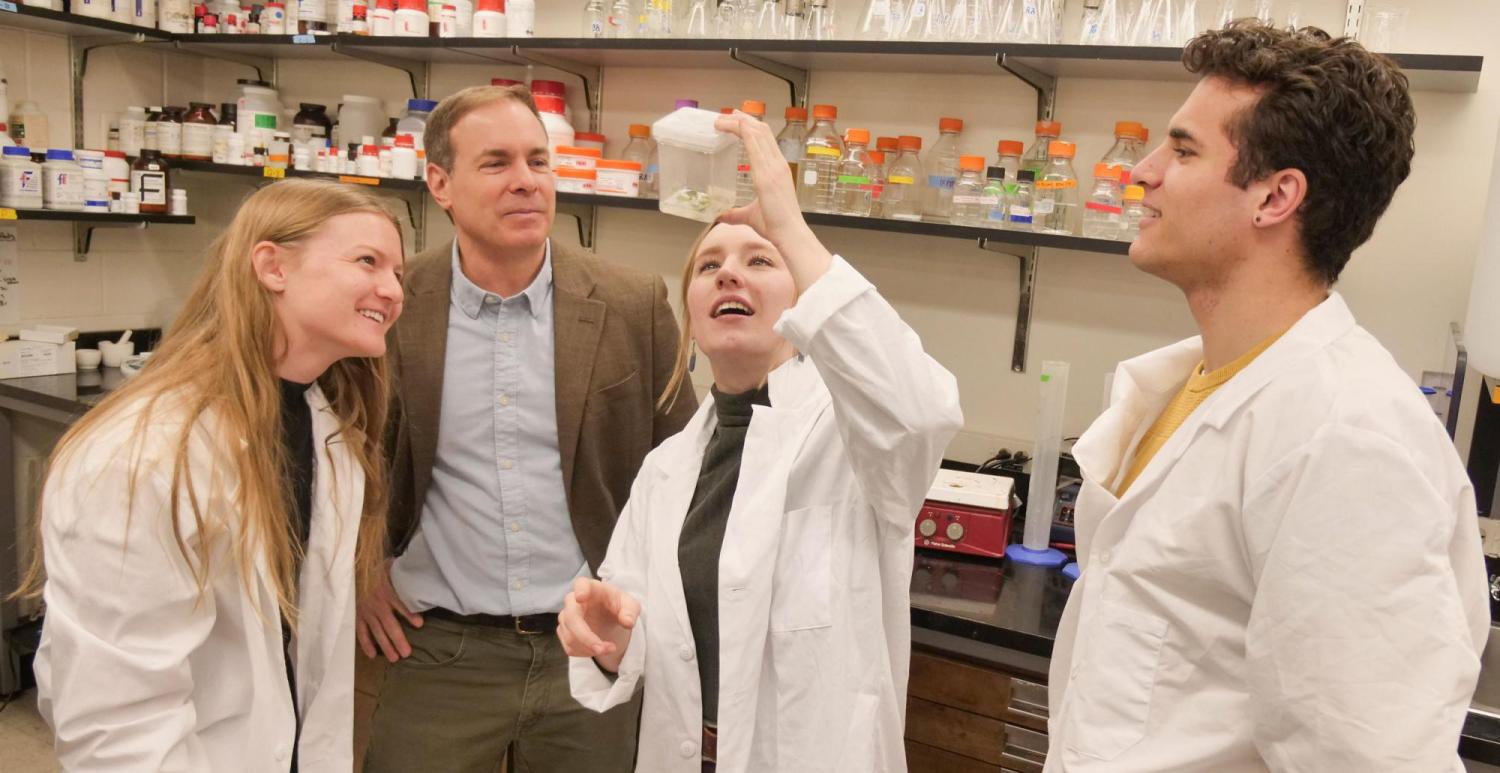 Brian DeDecker with students in his lab