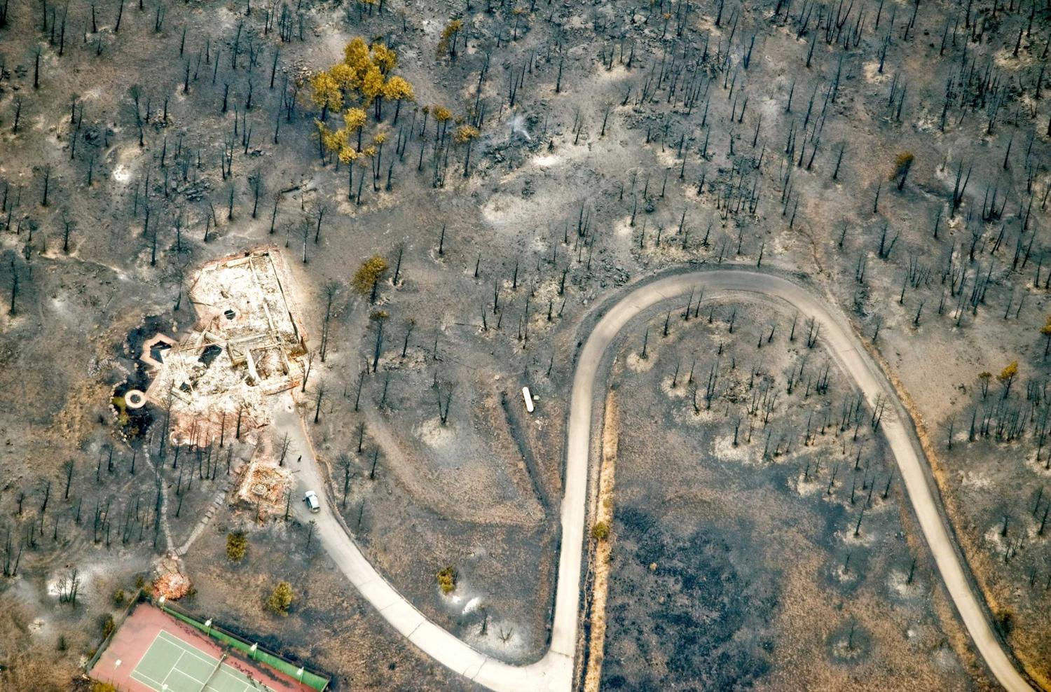 Wildfire damage in mountain neighborhood