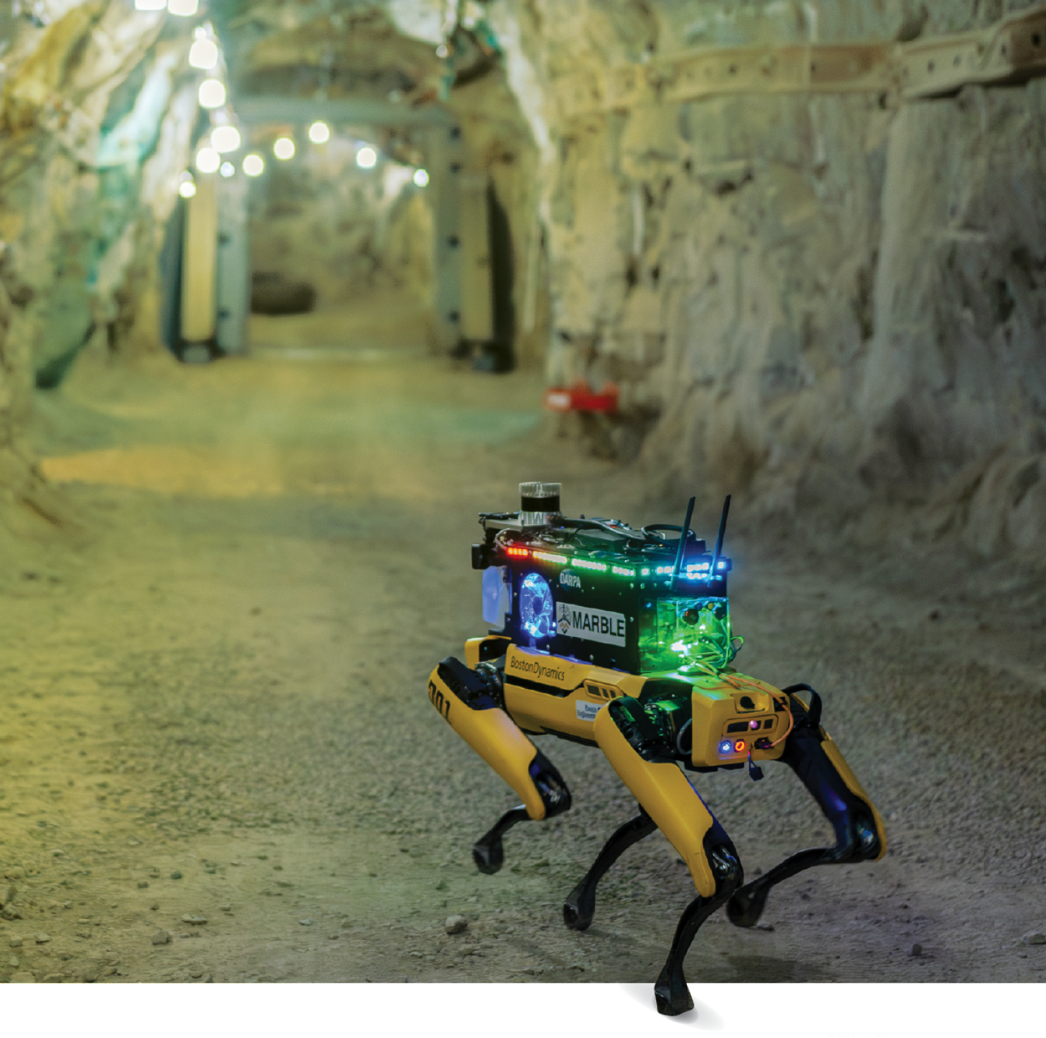 A modified Boston Dynamics Spot robot operates in an experimental mine in Colorado