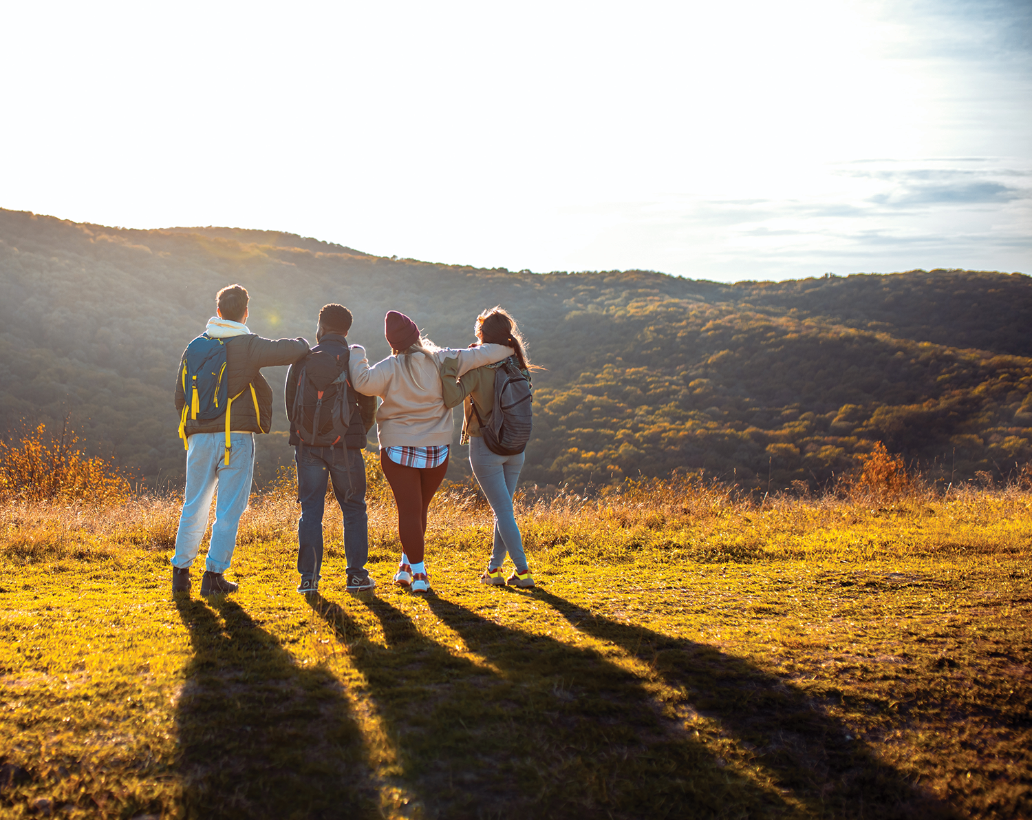 Group of young people hiking together