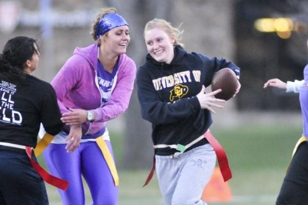 Students playing flag football