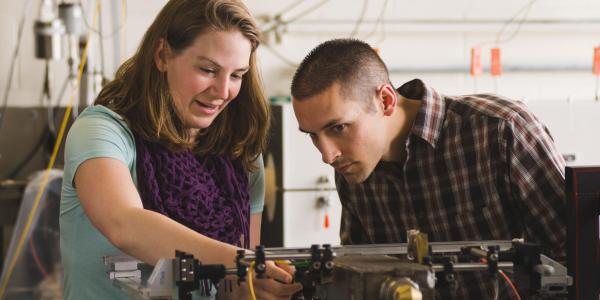 Professor and student in lab