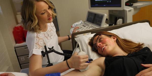 Researcher conducting research in Integrative Physiology lab