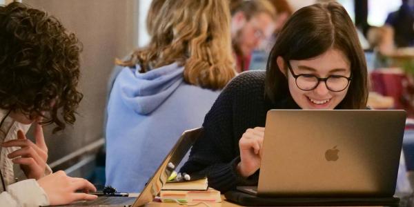 Students studying on laptops