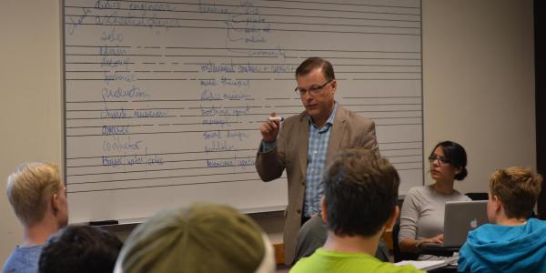 Faculty teaching music class