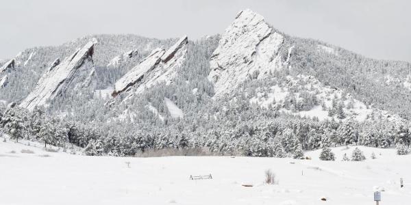 The Flatirons covered in snow