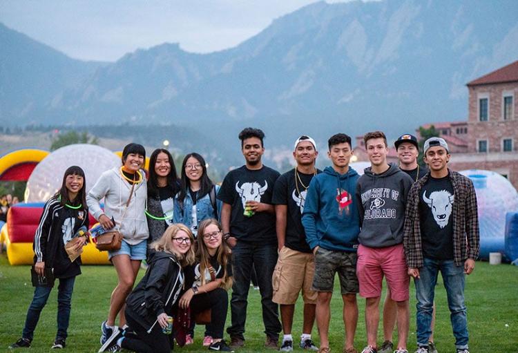 CU Boulder students outdoors at campus event