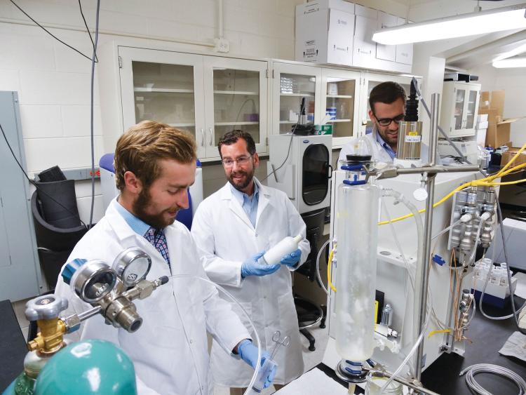 Mark Borden and team members in the lab