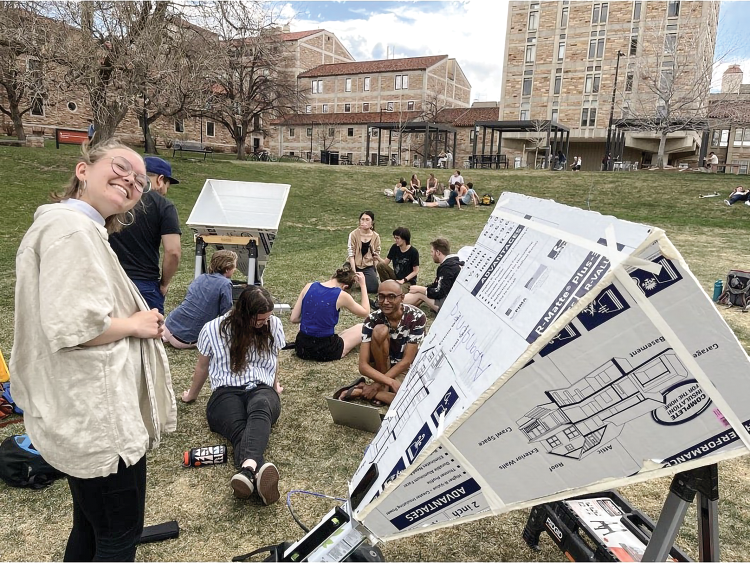 Students pointing their radio antennas to the sky outside Duane Physics