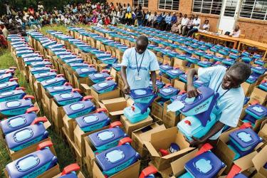Water filters being removed from boxes in Rwanda