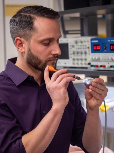 Mark Rentschler holding Endoculus device