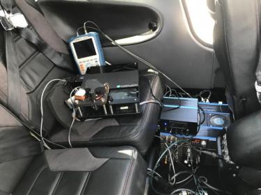 Equipment in the back seat of a small plane