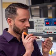 Mark Rentschler holding Endoculus device