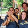 Students wearing CU Buffs gear celebrating at move-in table