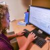 Student completing the Common Application on a computer