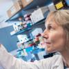 Professor Corrie Detweiler looking at bacteria