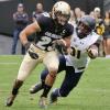 CU Boulder football player in action