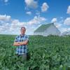 Brian DeDecker in a soybean field at his family farm in Illinois