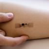 Tiny stethoscope on an arm