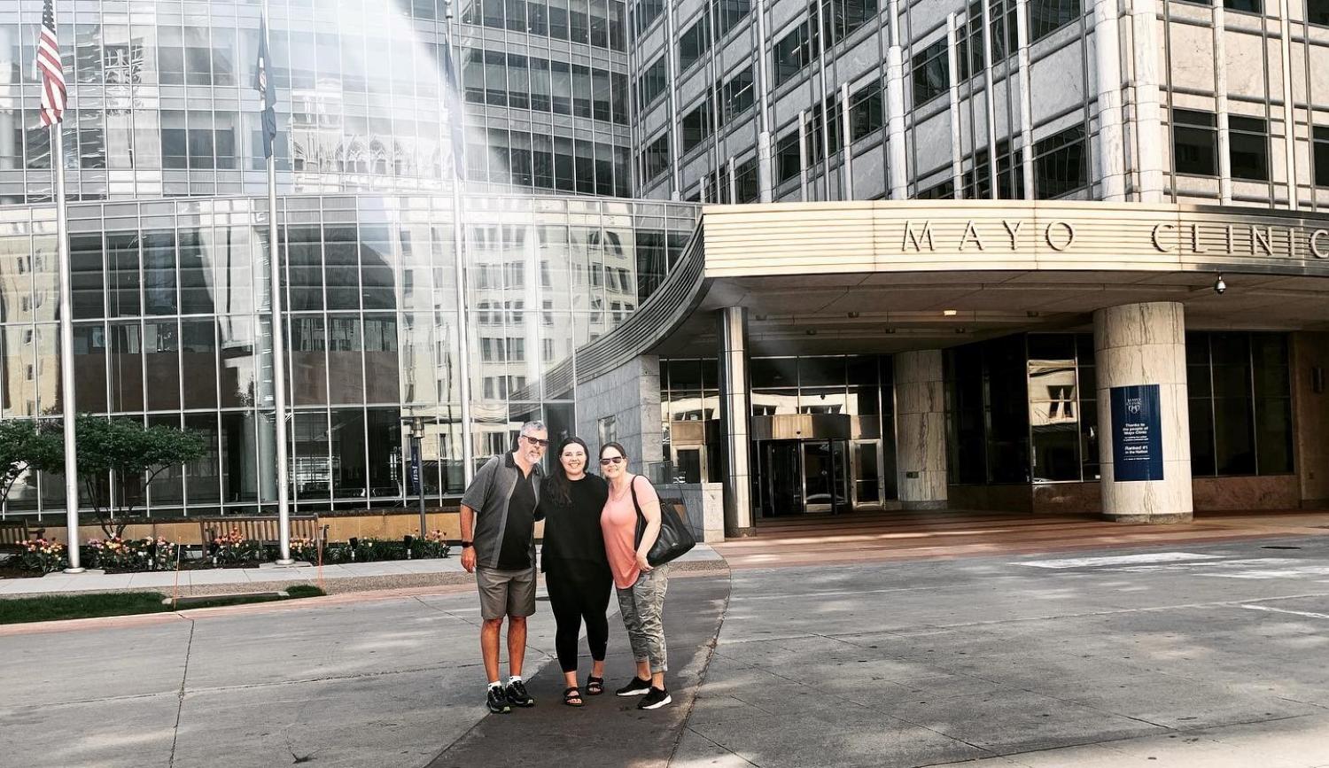 Madison Graham with her parents outside Mayo Clinc, Rochester