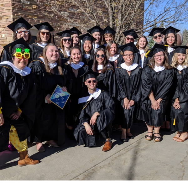 Class of 2022 MA-SLP cohort on graduation day in front of Benson Sciences