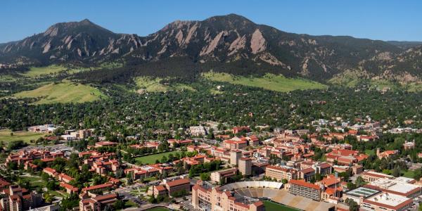 Ariel picture of CU Boulder with mountains in the background