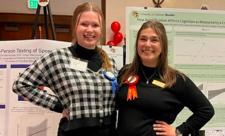 First and second place winners of the CAA poster Presentation