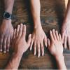Diverse hands together